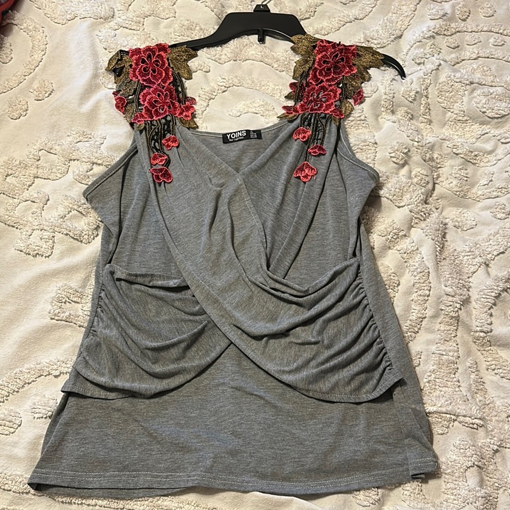 Gray Sleeveless Top with Red Floral Accents